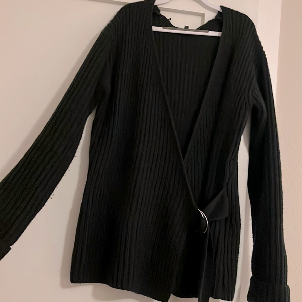 Black ribbed cardigan sweater with belt.